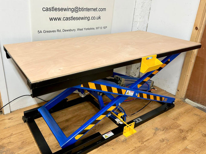 Upholstery lifting table