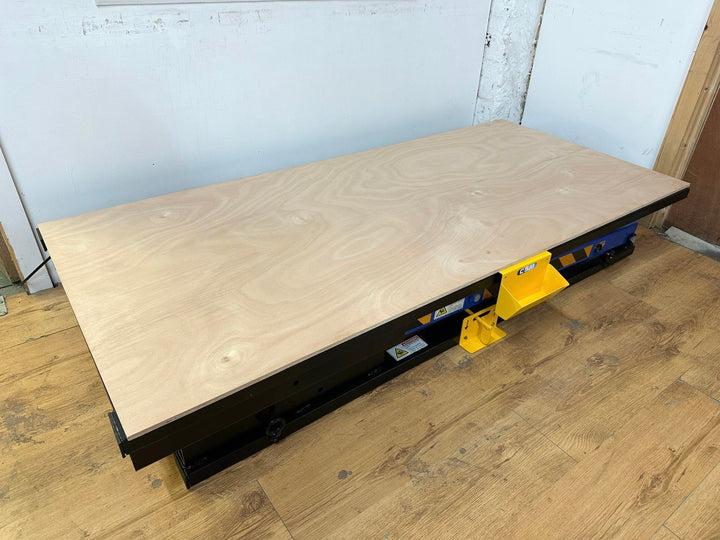 Upholstery lifting table